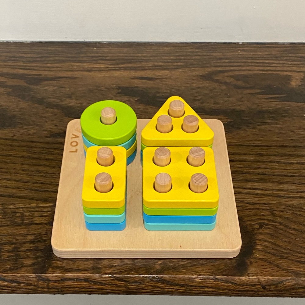 Wooden lovevery sort and stack puzzle